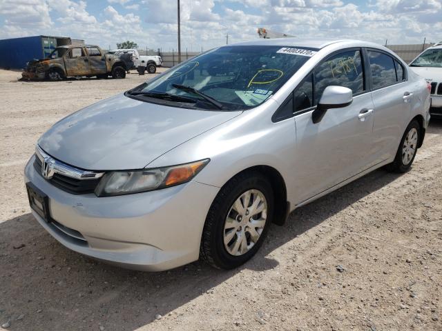 Photo 1 VIN: 19XFB2F55CE046356 - HONDA CIVIC LX 