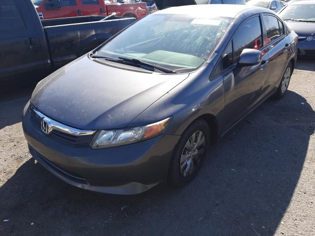 Photo 1 VIN: 19XFB2F55CE046843 - HONDA CIVIC LX 