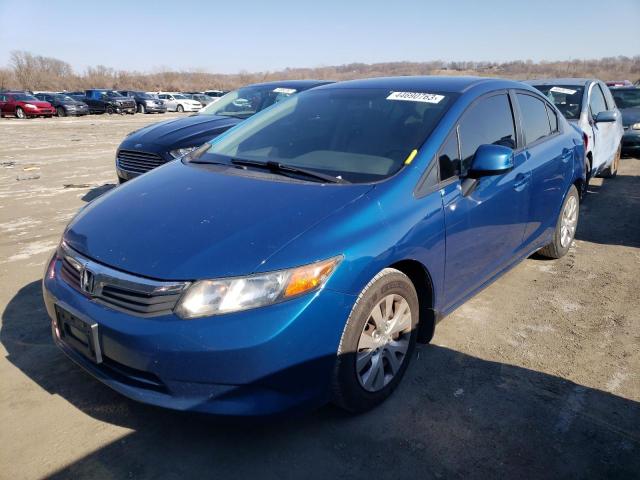 Photo 0 VIN: 19XFB2F55CE077509 - HONDA CIVIC LX 