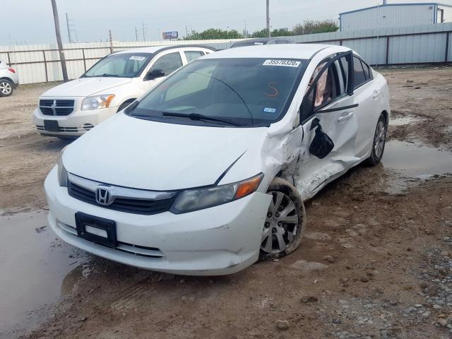 Photo 1 VIN: 19XFB2F55CE080300 - HONDA CIVIC LX 