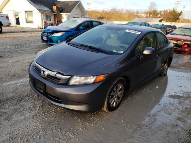 Photo 1 VIN: 19XFB2F55CE098294 - HONDA CIVIC LX 