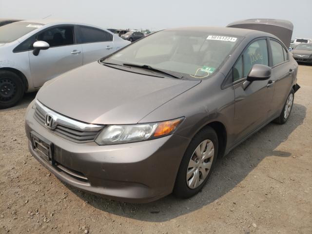 Photo 1 VIN: 19XFB2F55CE360878 - HONDA CIVIC LX 