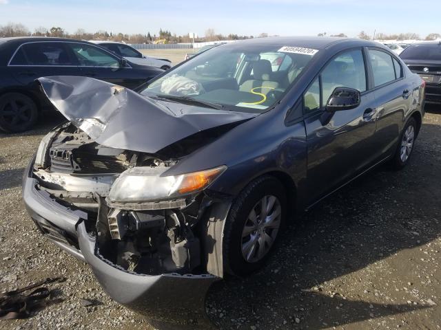 Photo 1 VIN: 19XFB2F55CE361674 - HONDA CIVIC LX 