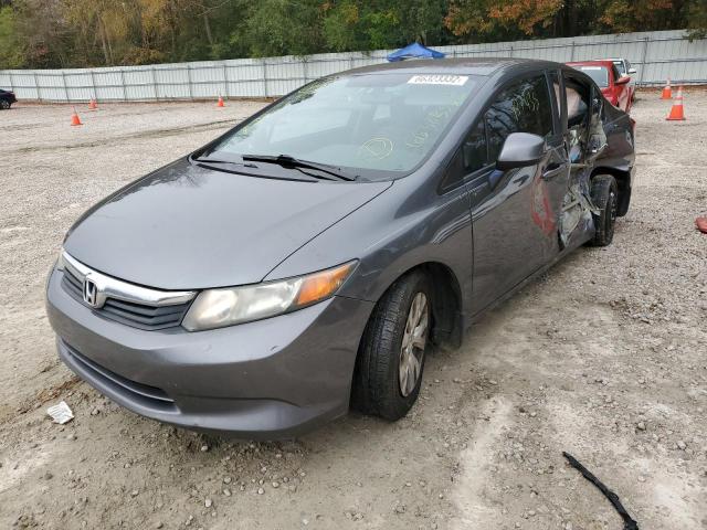 Photo 1 VIN: 19XFB2F55CE383481 - HONDA CIVIC LX 