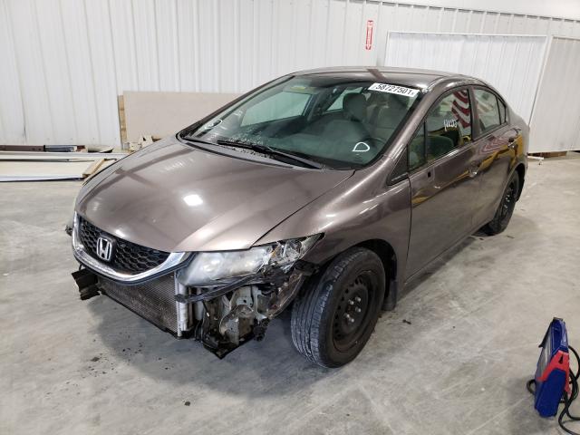 Photo 1 VIN: 19XFB2F55DE037951 - HONDA CIVIC LX 