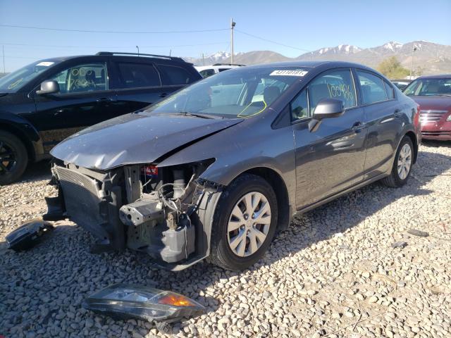 Photo 1 VIN: 19XFB2F56CE069760 - HONDA CIVIC LX 