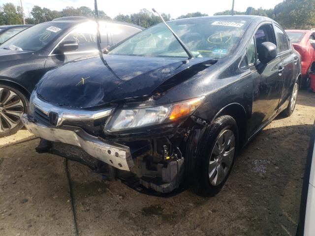 Photo 1 VIN: 19XFB2F56CE308806 - HONDA CIVIC LX 