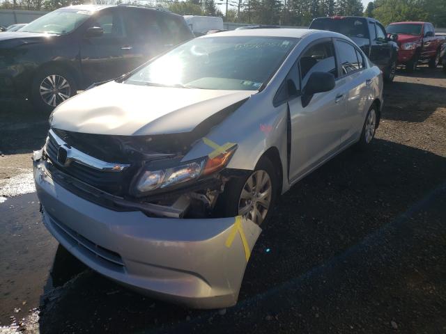 Photo 1 VIN: 19XFB2F56CE334418 - HONDA CIVIC LX 