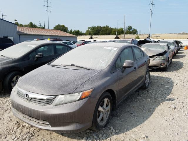 Photo 1 VIN: 19XFB2F56CE339442 - HONDA CIVIC LX 