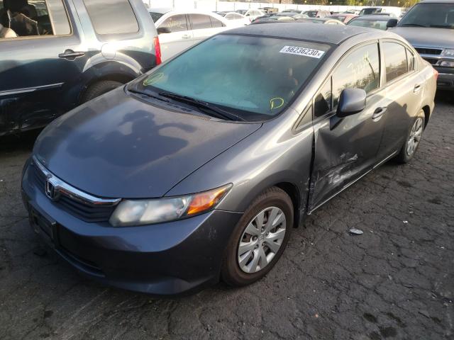 Photo 1 VIN: 19XFB2F56CE372442 - HONDA CIVIC LX 