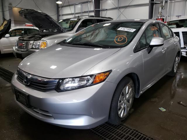 Photo 1 VIN: 19XFB2F57CE009504 - HONDA CIVIC LX 