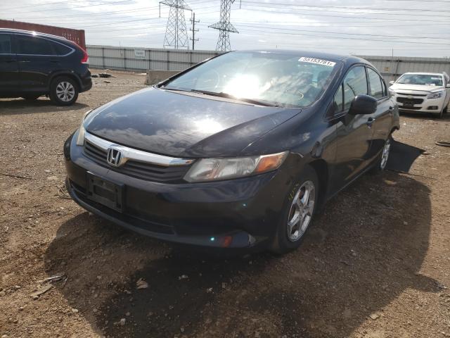 Photo 1 VIN: 19XFB2F57CE025847 - HONDA CIVIC LX 