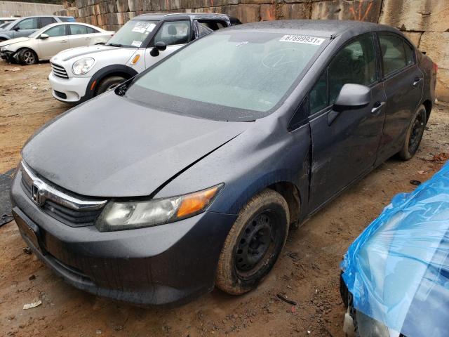 Photo 1 VIN: 19XFB2F57CE033561 - HONDA CIVIC LX 