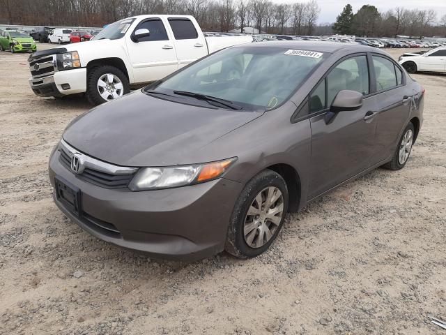 Photo 1 VIN: 19XFB2F57CE040395 - HONDA CIVIC LX 