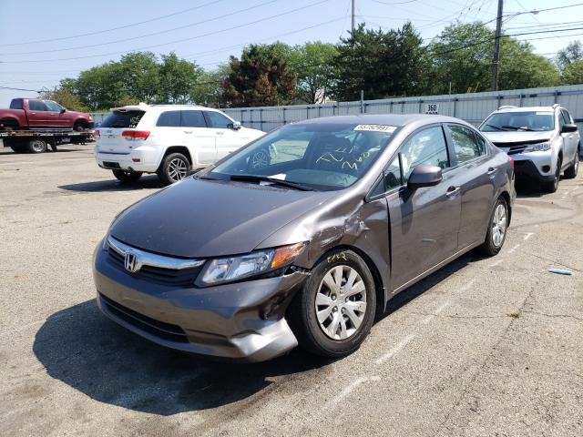 Photo 1 VIN: 19XFB2F57CE068973 - HONDA CIVIC LX 