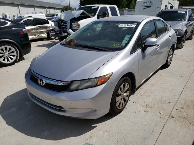 Photo 1 VIN: 19XFB2F57CE071906 - HONDA CIVIC LX 