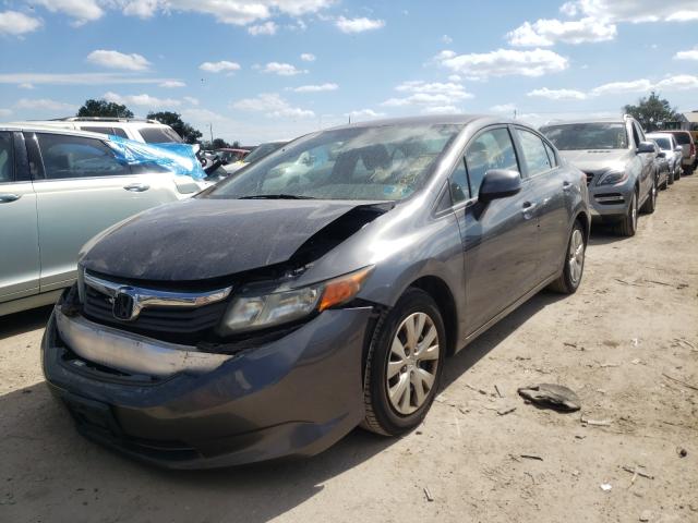 Photo 1 VIN: 19XFB2F57CE086437 - HONDA CIVIC LX 