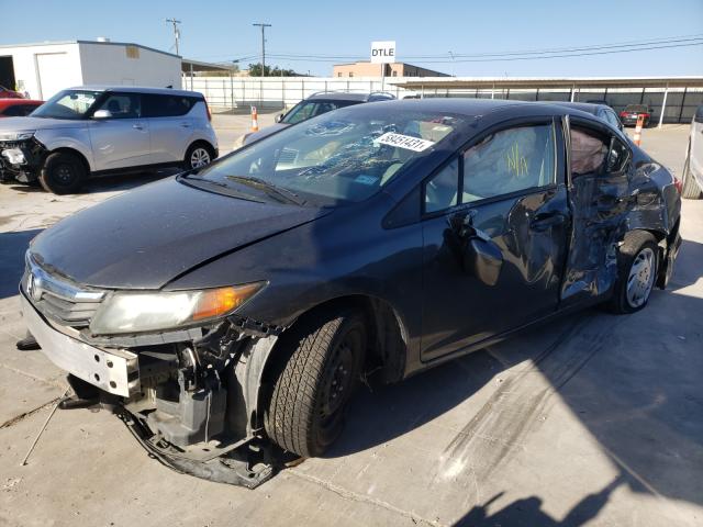 Photo 1 VIN: 19XFB2F57CE090357 - HONDA CIVIC LX 