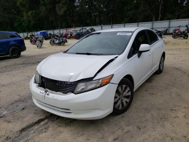 Photo 1 VIN: 19XFB2F57CE107206 - HONDA CIVIC LX 