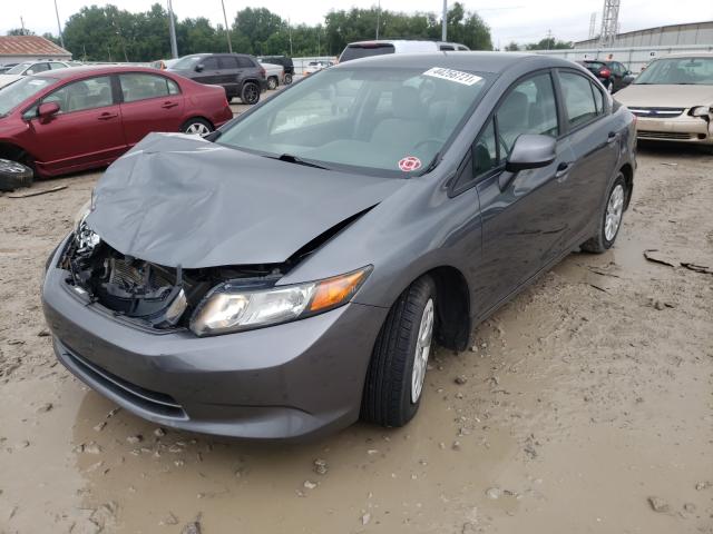 Photo 1 VIN: 19XFB2F57CE107951 - HONDA CIVIC LX 