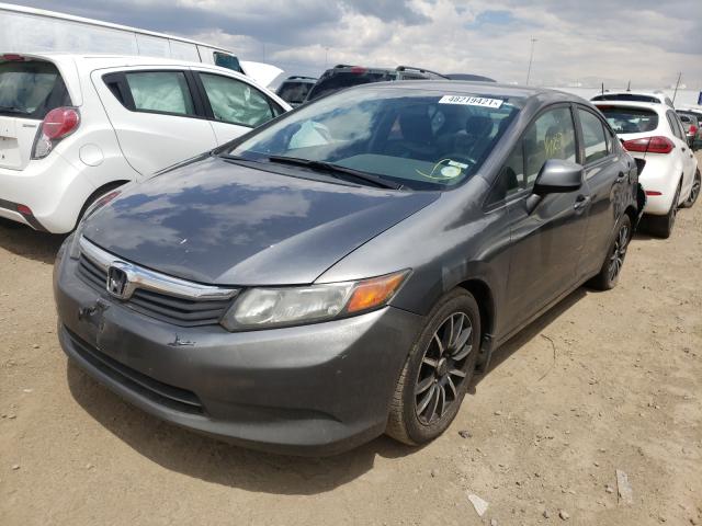 Photo 1 VIN: 19XFB2F57CE306000 - HONDA CIVIC LX 