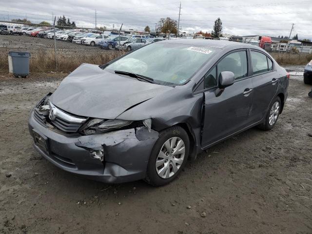 Photo 1 VIN: 19XFB2F57CE308183 - HONDA CIVIC LX 