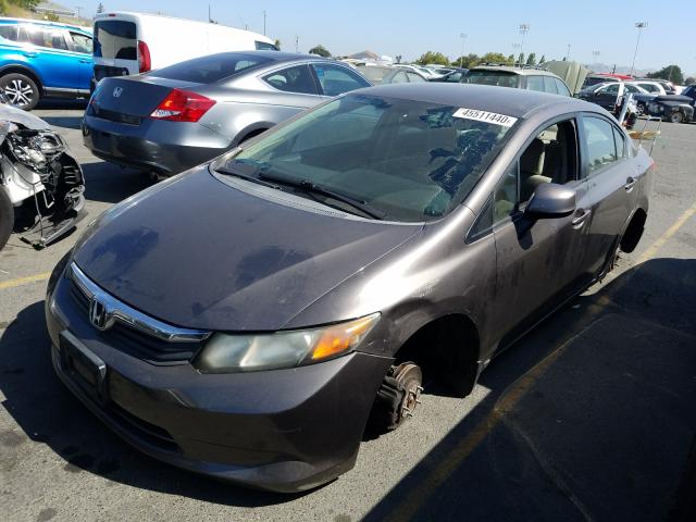 Photo 1 VIN: 19XFB2F57CE323640 - HONDA CIVIC LX 