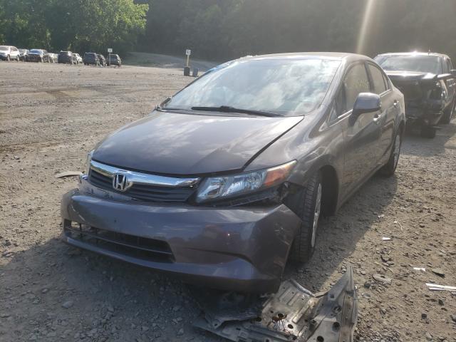 Photo 1 VIN: 19XFB2F57CE324769 - HONDA CIVIC LX 