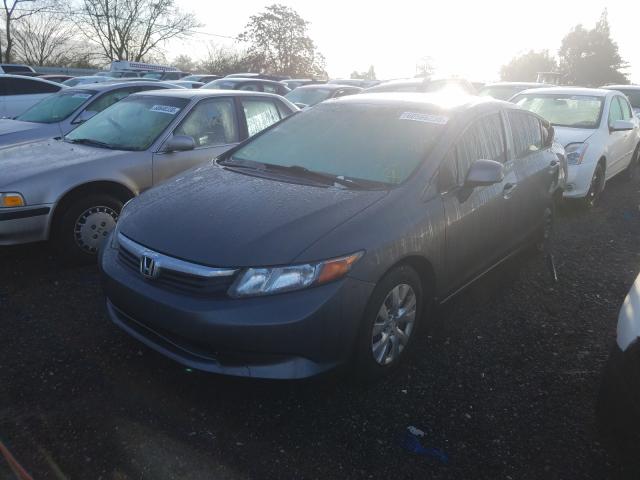 Photo 1 VIN: 19XFB2F57CE343080 - HONDA CIVIC LX 