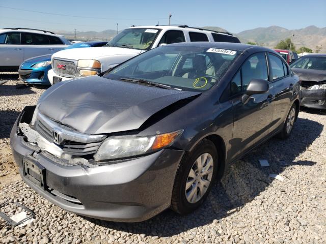 Photo 1 VIN: 19XFB2F57CE367640 - HONDA CIVIC LX 