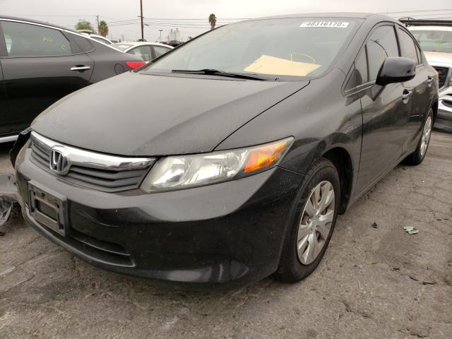 Photo 1 VIN: 19XFB2F57CE384597 - HONDA CIVIC LX 