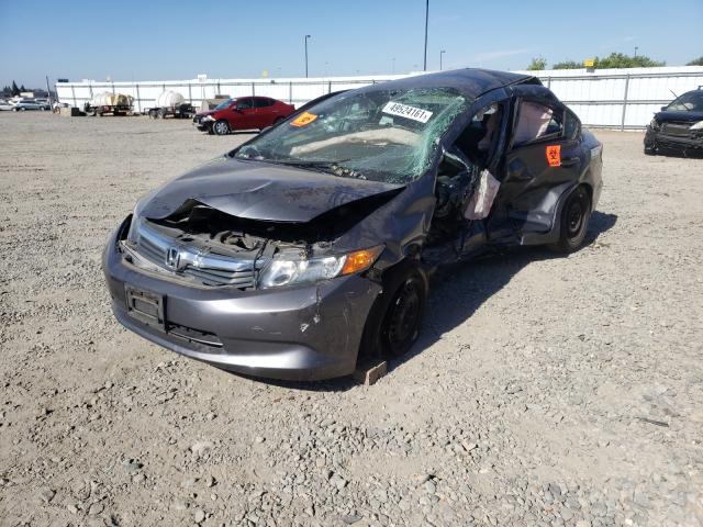 Photo 1 VIN: 19XFB2F57CE387662 - HONDA CIVIC LX 