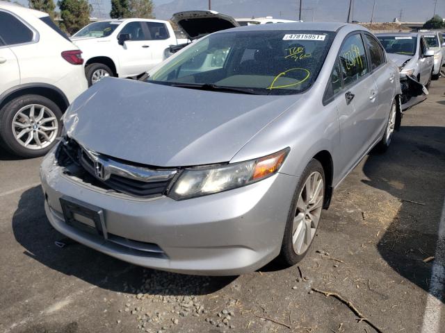 Photo 1 VIN: 19XFB2F57CE391842 - HONDA CIVIC LX 