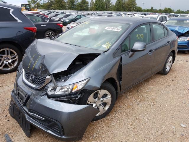 Photo 1 VIN: 19XFB2F57DE067243 - HONDA CIVIC LX 