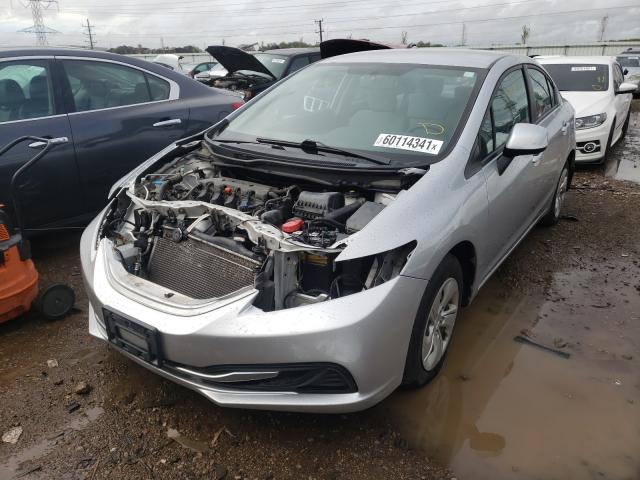 Photo 1 VIN: 19XFB2F57DE075813 - HONDA CIVIC LX 