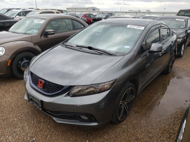 Photo 1 VIN: 19XFB2F57DE228108 - HONDA CIVIC LX 