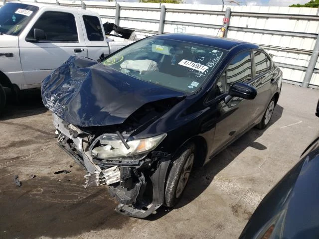 Photo 1 VIN: 19XFB2F57EE054557 - HONDA CIVIC LX 