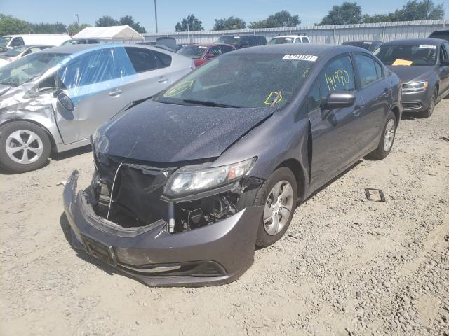 Photo 1 VIN: 19XFB2F57EE234041 - HONDA CIVIC LX 