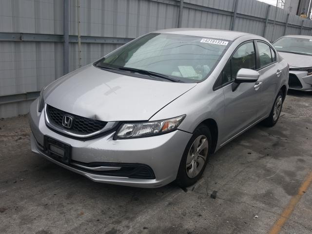 Photo 1 VIN: 19XFB2F57EE262809 - HONDA CIVIC LX 