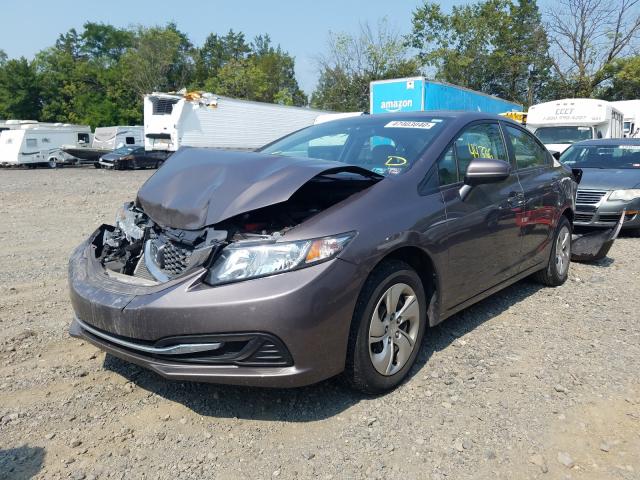 Photo 1 VIN: 19XFB2F57FE286013 - HONDA CIVIC LX 