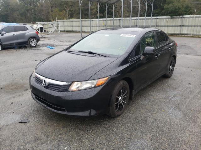 Photo 1 VIN: 19XFB2F58CE011729 - HONDA CIVIC LX 