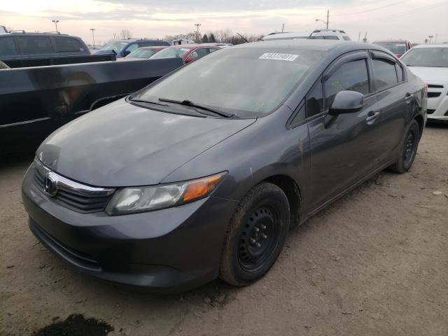 Photo 1 VIN: 19XFB2F58CE038980 - HONDA CIVIC LX 