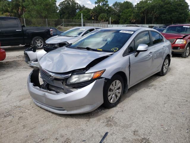 Photo 1 VIN: 19XFB2F58CE049266 - HONDA CIVIC LX 