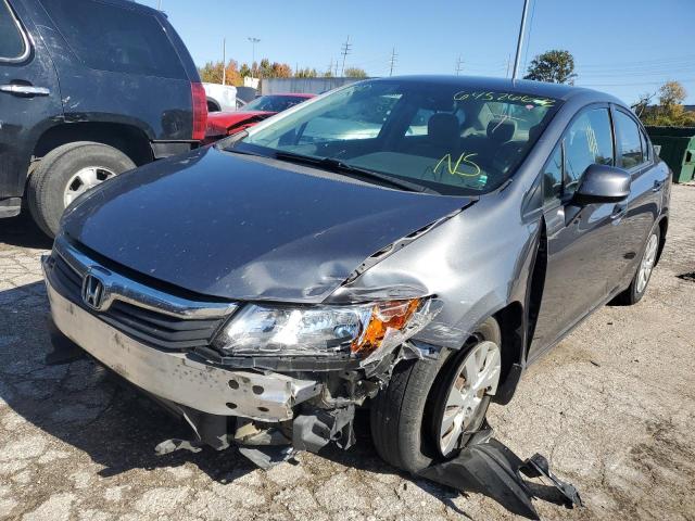 Photo 1 VIN: 19XFB2F58CE055875 - HONDA CIVIC LX 