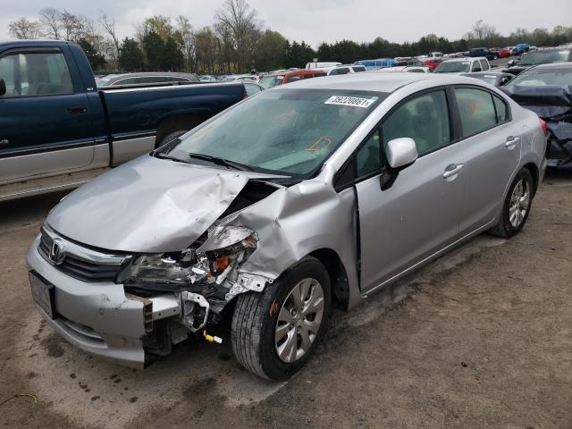 Photo 1 VIN: 19XFB2F58CE063488 - HONDA CIVIC LX 