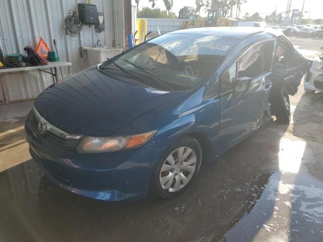 Photo 1 VIN: 19XFB2F58CE069596 - HONDA CIVIC LX 