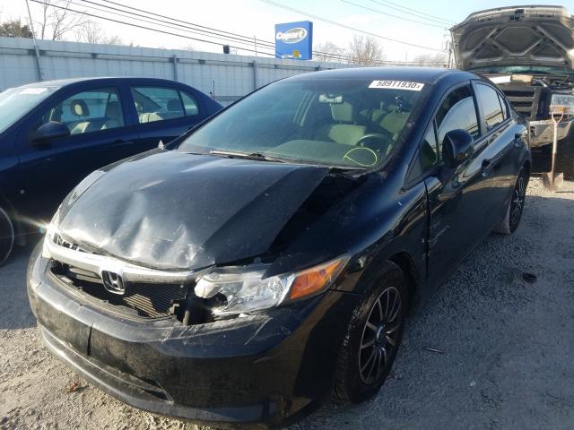 Photo 1 VIN: 19XFB2F58CE070876 - HONDA CIVIC LX 