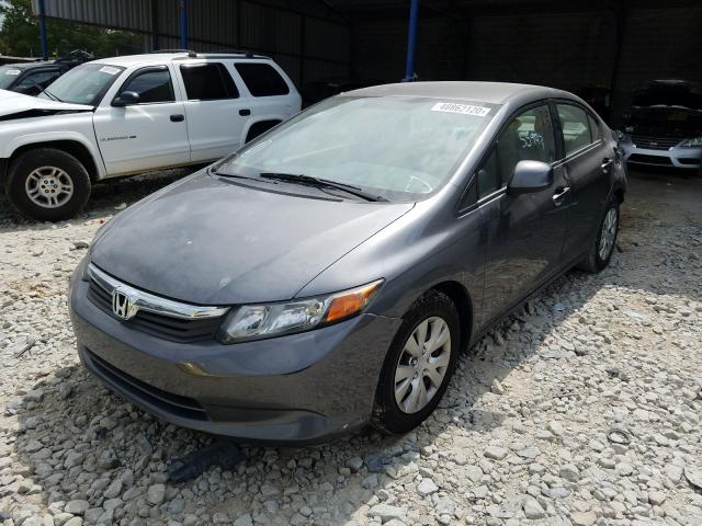 Photo 1 VIN: 19XFB2F58CE091064 - HONDA CIVIC LX 