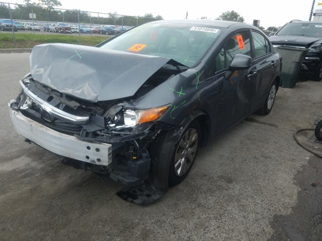 Photo 1 VIN: 19XFB2F58CE092036 - HONDA CIVIC LX 