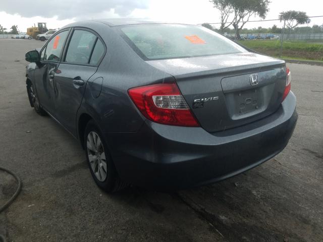 Photo 2 VIN: 19XFB2F58CE092036 - HONDA CIVIC LX 